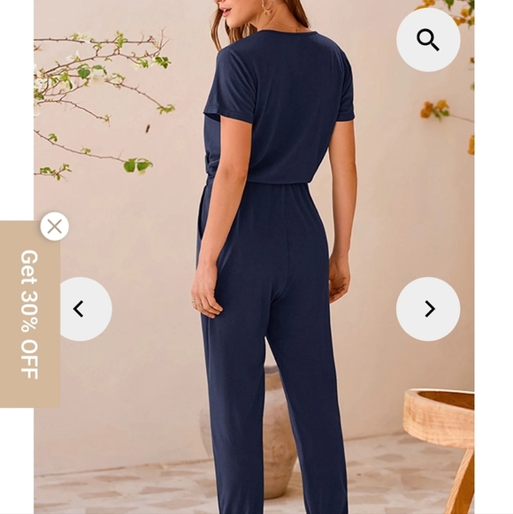 Sophisticated Black Wrap-Style Jumpsuit with Tapered Legs - Picture 12 of 14